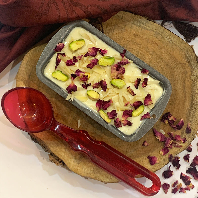 Thandai Ice cream topped with almonds, pista and edible rose petals.